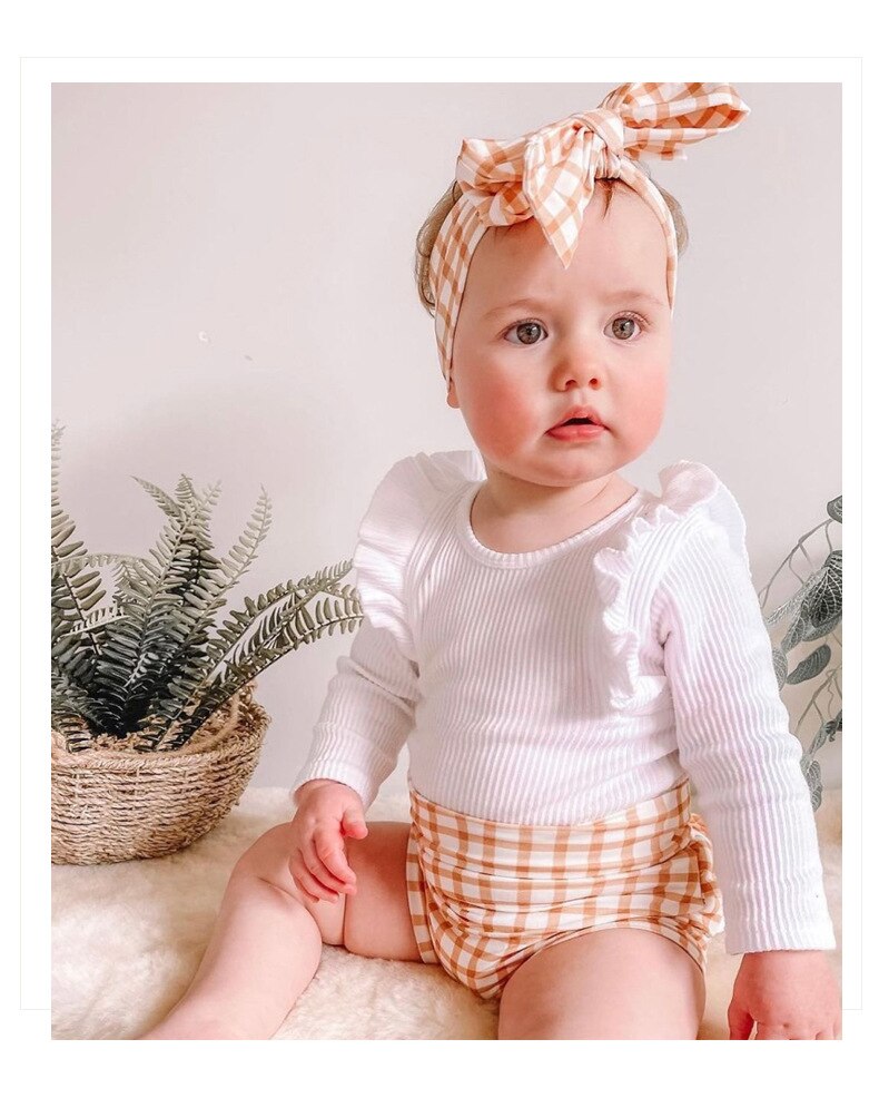 Ribbed Ruffle Sleeve Onesie & Matching Bow in White